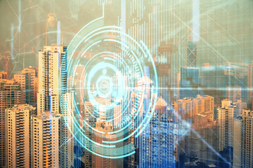 Data theme hologram drawing on city view with skyscrapers background double exposure. Technology concept.