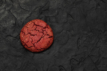 Cherry velvet cookies on a black background.