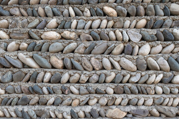 Texture background stone wall grunge facing coarse.