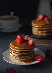 Pancakes with strawberries for breakfast