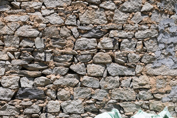Grunge texture stone wall background.