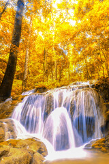 Landscape autumn waterfall.
