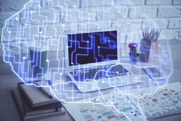 Multi exposure of work space with computer and human brain hologram. Brainstorm concept.