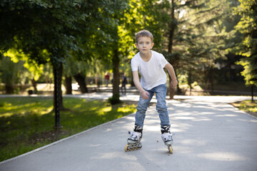 Children ride on roller skates in the park.