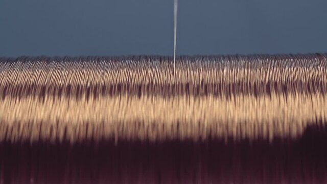 Copper cable manufacturing process. Copper cable spool rotation