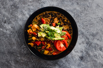 plant-based food, vegan poke bowl with mexican beans capsicums tomatoes and avocado