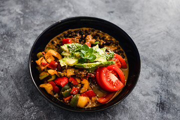 plant-based food, vegan poke bowl with mexican beans capsicums tomatoes and avocado