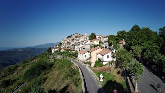 Road leading to the hilltop village of Bajardo, inland Liguria, Italy