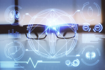 Science drawing with glasses on the table background. Concept of education. Double exposure.
