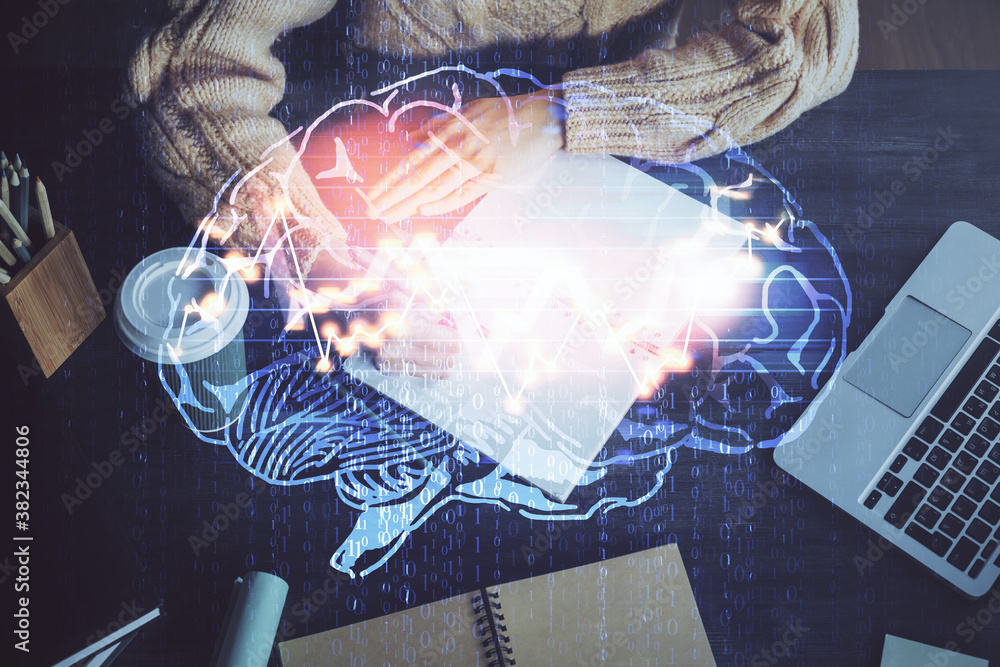 Poster multi exposure of writing hand on background with brain hologram. concept of learning.