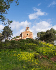 Fototapeta premium mediterranean little chapel over a hill in the countryside. Menorca, Spain.