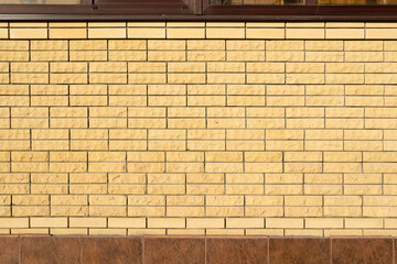 Yellow background wall of decorative bricks.