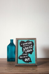 Inspiring quotes on wooden table. Minimalist concept for office desk