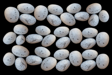 Close up of chocolate eggs geometrically arranged on background. Easter holiday concept