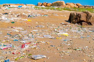 The trash view on the wild beach on Hainan in China