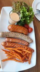 Pork steak and salad cream placed in beautiful dish.