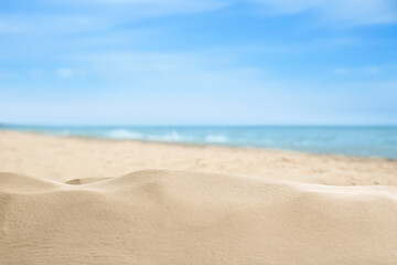 Fototapeta na wymiar Beautiful beach with golden sand near sea, closeup view