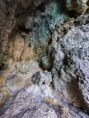 Sea coast calcium calcite cave interior inside top ceiling 