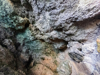 Sea coast calcium calcite cave interior inside top ceiling 