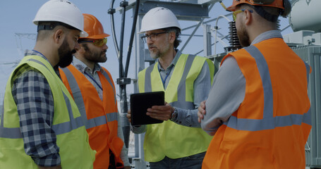 Male engineers on power plant