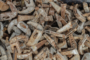 Clamping a construction site for concrete walls. The steel formwork clamps are rusty. Rusty details for the background.