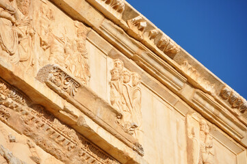 Closeup detail of the stone work of the Arch of Septimius Severus at Leptis Magna in Khoms, Libya.