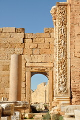 Fototapeta na wymiar Decorative columns inside the Basilica of Septimius at Leptis Magna in Khoms, Libya.