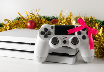 Game console and controller with gift bow for Christmas
