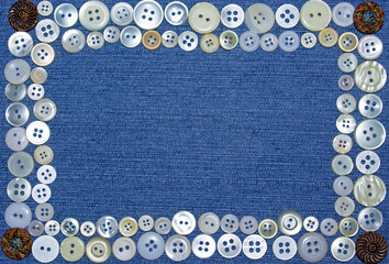 Buttons frame on  blue jeans  texture background