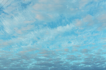 The texture of the blue sky with many blue clouds