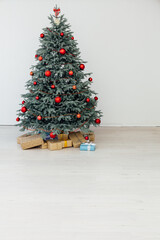 Christmas tree blue pine with gifts interior decor white room new year winter holiday