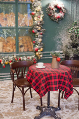 Fototapeta na wymiar Christmas cafe bakery exterior with decorations