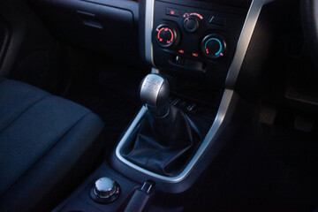 automatic transmission shift selector in the car interior. Closeup a manual shift of modern car gear sifter.