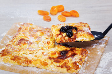 delicious charming cake with cottage cheese dried apricots and cherry jam
