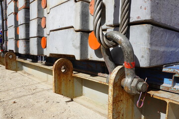 Shackles and wire slings set connecting to lift up counterweight of crawler crane at the...