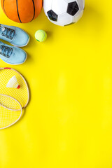 Sport games background - basketball, soccer ball, rackets, sneakers - copy space © 9dreamstudio
