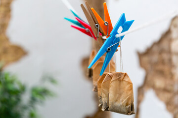Drying clips laundry hanger with used tea sachets bags