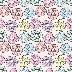 Scrunchy repeat pattern design. Seamless pattern with hair ties.