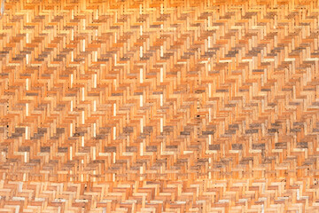 Bamboo brown straw mat, abstract background texture.