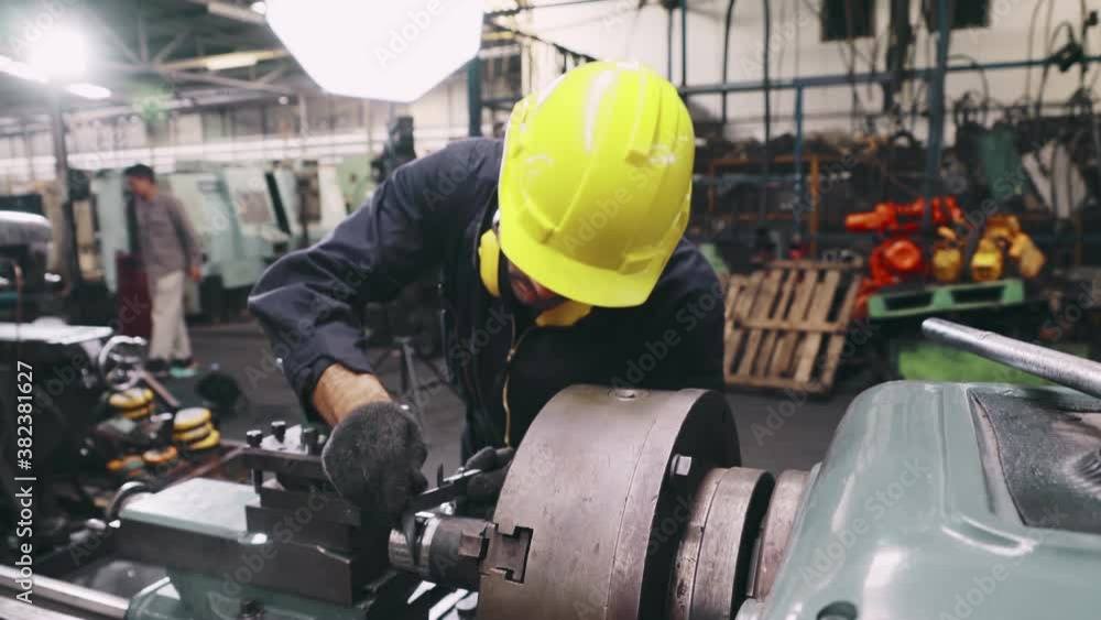 Poster smart factory worker using machine in factory workshop . industry and engineering concept.