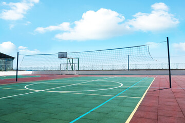 Fototapeta premium Volleyball court with net on sunny day