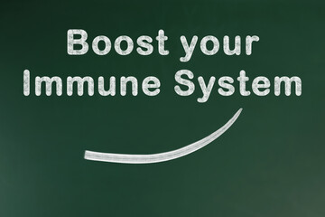 Phrase Boost Your Immune System on green chalkboard