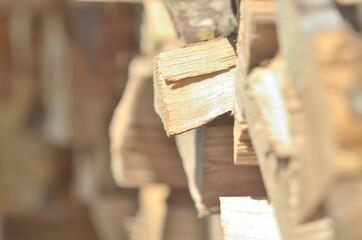 Fototapeta na wymiar Photo of a stack of firewood in the sun