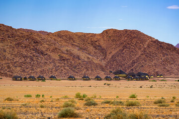 Small cabins of a desert lodge near Sossusvlei in Namibia