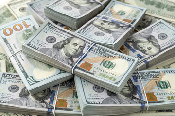 New design dollar 100 bundles pile or heap. Shallow depth of field.