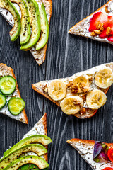 healthy breakfast with sandwiches set on white background top view