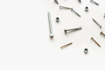 bolts with nuts on a white background, bolts and nuts