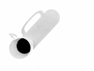 cup of coffee top view, black and white with shadow - copy space