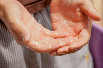 hands of a person. Man show clean hands after washing 