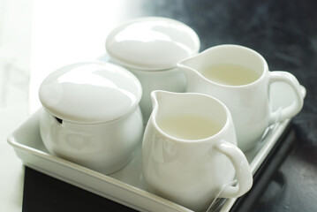 White Cup of Milk on a light Background